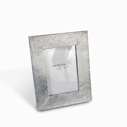 Portaretato repujado plateado