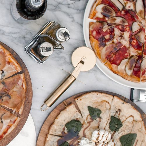 Corta pizza dorado